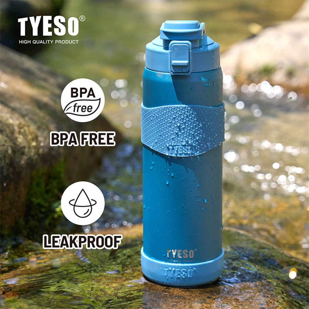 Blue water bottle with TYESO branding on a natural background