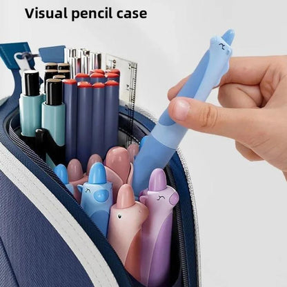 Blue pencil case with stationery items including pens and a small blue animal-shaped container.