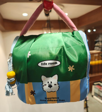 Colorful bag with cartoon character and 'life room' text in an indoor setting