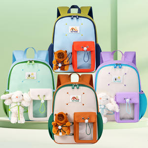 Collection of colorful backpacks with decorative elements on a light green background